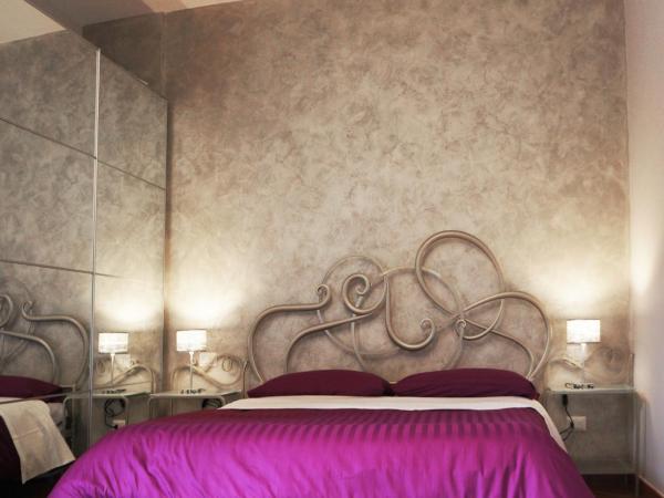 B&B Terrazza Belfiore : photo 3 de la chambre chambre quadruple