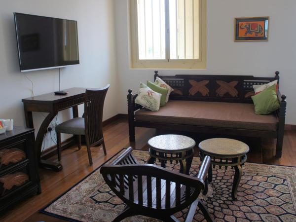 Heeren Palm Suites : photo 3 de la chambre suite junior de luxe