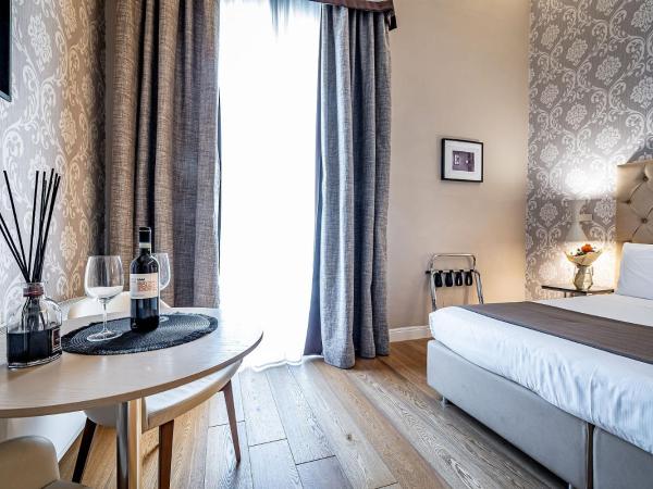 Martelli 6 Suite & Apartments : photo 9 de la chambre chambre lit king-size supérieure