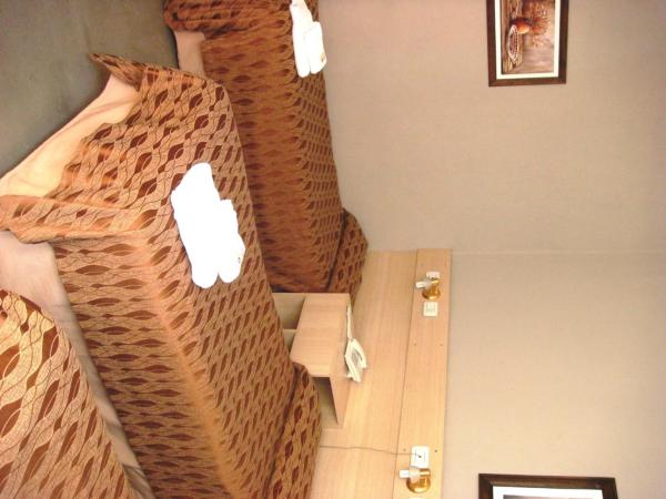 Hagoth Hostel : photo 2 de la chambre chambre triple avec salle de bains commune