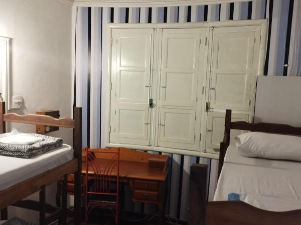 Home Center : photo 5 de la chambre chambre quadruple avec salle de bains commune