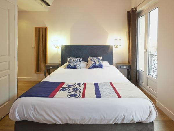 Htel St Sernin : photo 5 de la chambre chambre double ou lits jumeaux premium