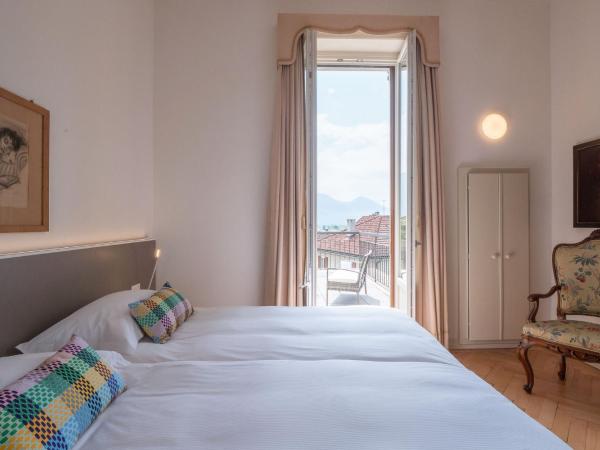 Villa by @ Home Hotel Locarno : photo 2 de la chambre suite de luxe avec balcon