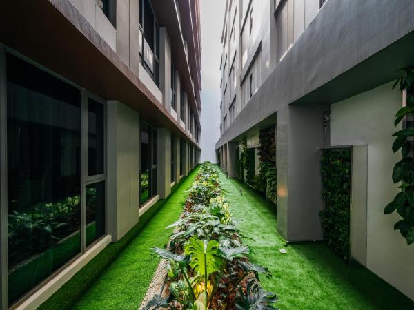 Mercure Singapore Tyrwhitt : photo 6 de la chambre chambre double privilège avec vue sur le jardin