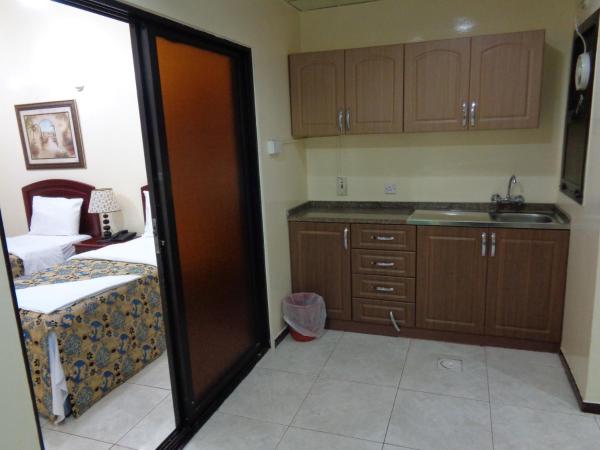 Deira Palace Hotel : photo 4 de la chambre chambre quadruple standard