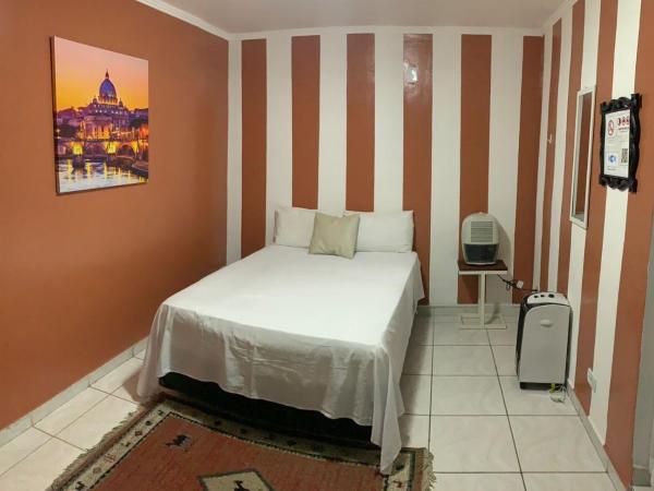Hostel Ipê : photo 1 de la chambre chambre triple avec salle de bains privative