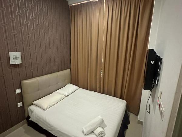 One Point Hotel @ Airport (Kuching) : photo 1 de la chambre chambre lit queen-size