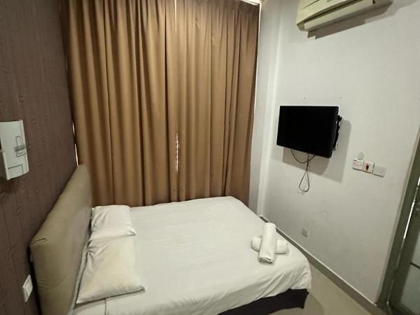 One Point Hotel @ Airport (Kuching) : photo 2 de la chambre chambre lit queen-size