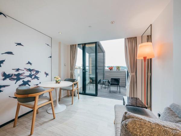 The Pier Hotel : photo 4 de la chambre hébergement double deluxe avec terrasse