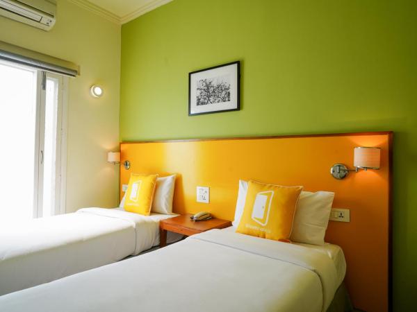 Bloom Boutique l Signature Towers : photo 1 de la chambre chambre lits jumeaux deluxe