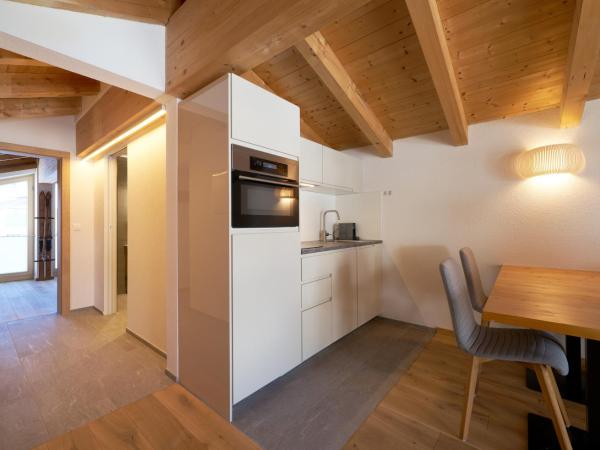 Aparthotel Grischuna : photo 2 de la chambre suite supérieure 