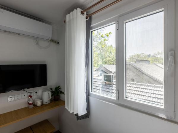 Happy Dragon Hotel - close to Forbidden City&Wangfujing Street&free coffee &English speaking,Newly renovated with tour service : photo 5 de la chambre chambre lits jumeaux