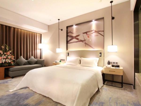 Shenzhen Shuidu Holiday Hotel, North Railway Station : photo 8 de la chambre chambre lit queen-size deluxe