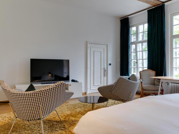 Small Luxury Hotel De Witte Lelie : photo 5 de la chambre chambre lit king-size supérieure