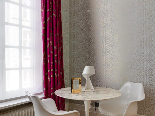 Small Luxury Hotel De Witte Lelie : photo 7 de la chambre suite lit king-size