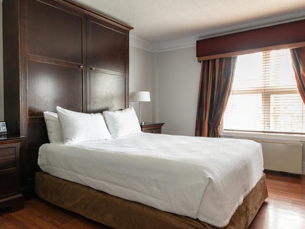 Hôtel Le Bonne Entente : photo 3 de la chambre suite classique lit king-size