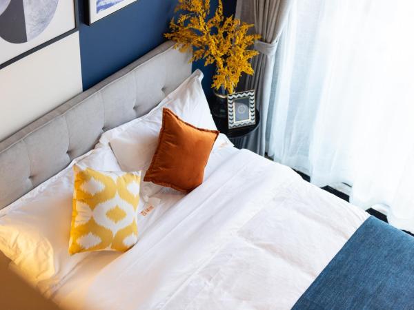 Livetour Hotel Pazhou Exhibition Center Guangzhou : photo 8 de la chambre chambre lits jumeaux supérieure avec balcon