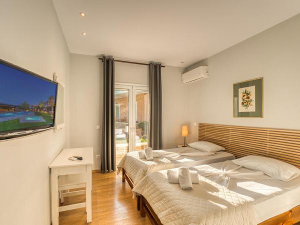 Folies Corfu Town Hotel Apartments : photo 1 de la chambre appartement (2-4 adultes)