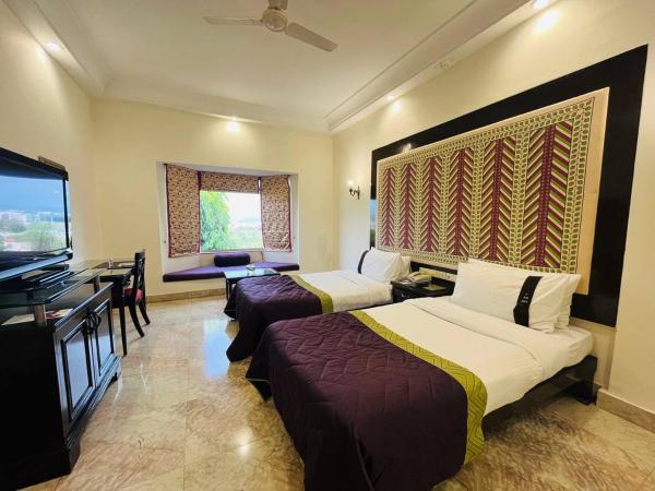 The Lalit Laxmi Vilas Palace : photo 2 de la chambre deluxe twin room with valley view - enjoy 10% discount f&b,spa & laundry