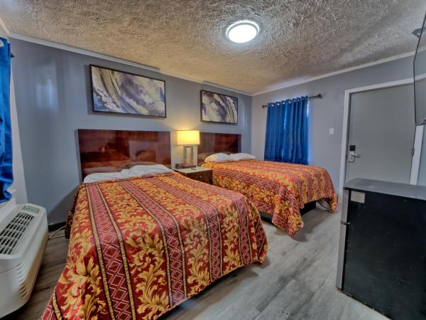 Aqua View Motel : photo 3 de la chambre chambre quadruple standard avec 2 lits doubles - non-fumeurs