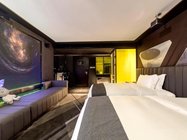 Movietel Shenzhen : photo 2 de la chambre comfortable movie room twin bed