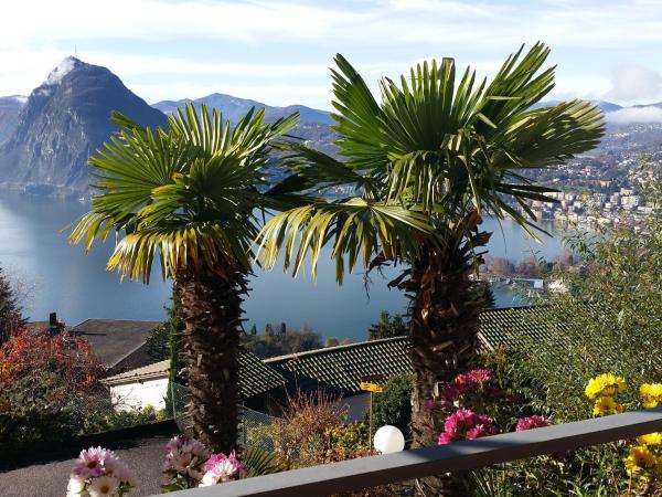 Hotel Colibrì : photo 2 de la chambre chambre triple avec balcon - vue sur lac