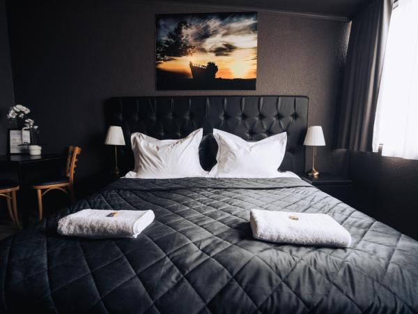 Brim Hotel : photo 10 de la chambre chambre double avec salle de bains commune