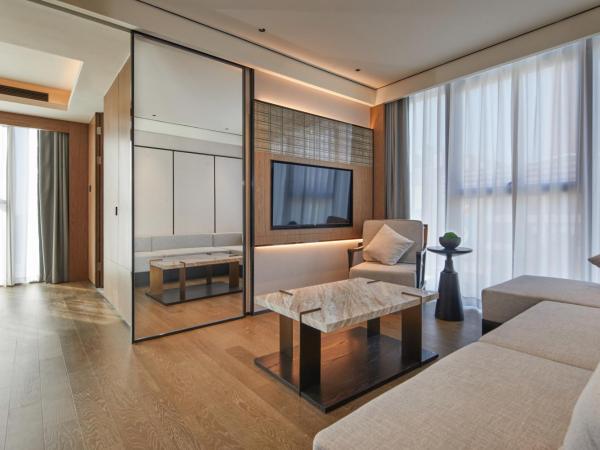 Dongguan Tangxia Huaman Hotel : photo 1 de la chambre suite affaires