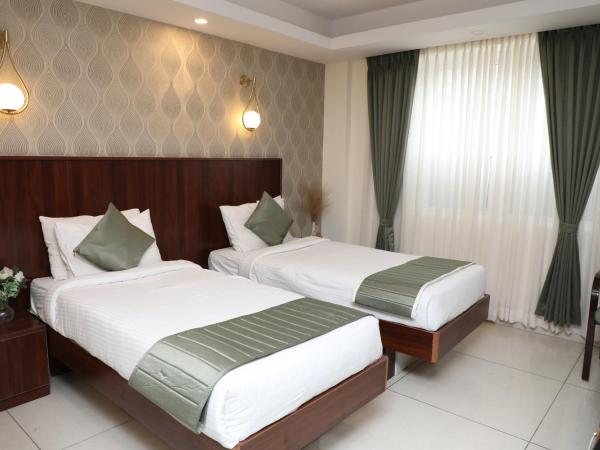 Earth Hotels : photo 3 de la chambre chambre lits jumeaux avec salle de bains