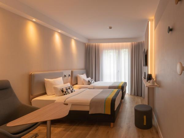 Holiday Inn Express Munich - City East, an IHG Hotel : photo 1 de la chambre chambre supérieure lits jumeaux