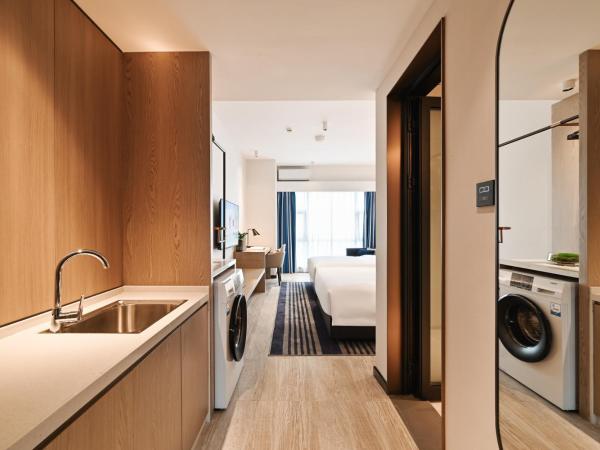 Livetour Hotel Luogang Science City Guangzhou : photo 5 de la chambre chambre lits jumeaux deluxe