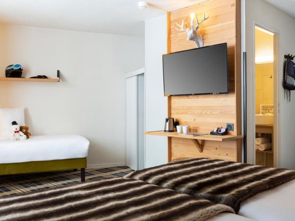 SOWELL Family La Lauzière : photo 5 de la chambre chambre triple avec balcon