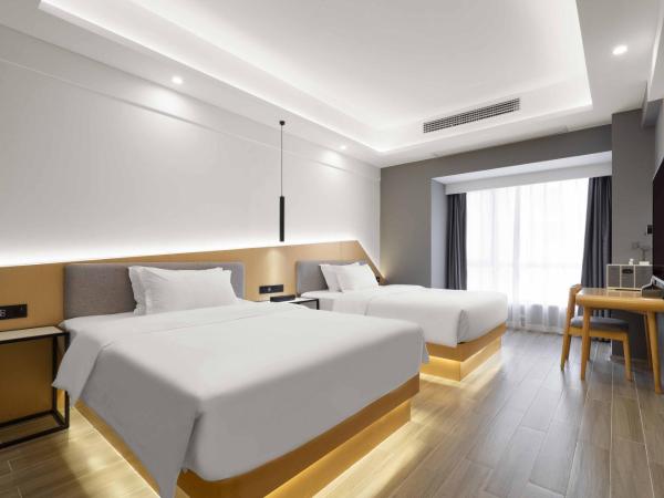 Weiming Hotel : photo 1 de la chambre yuexin twin room