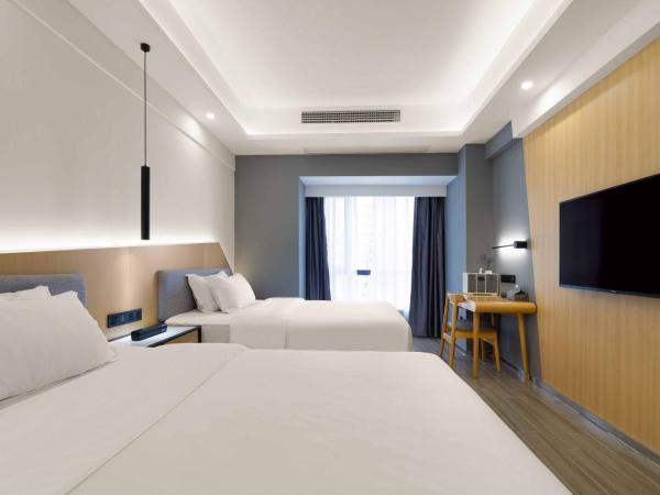 Weiming Hotel : photo 2 de la chambre yuexin twin room