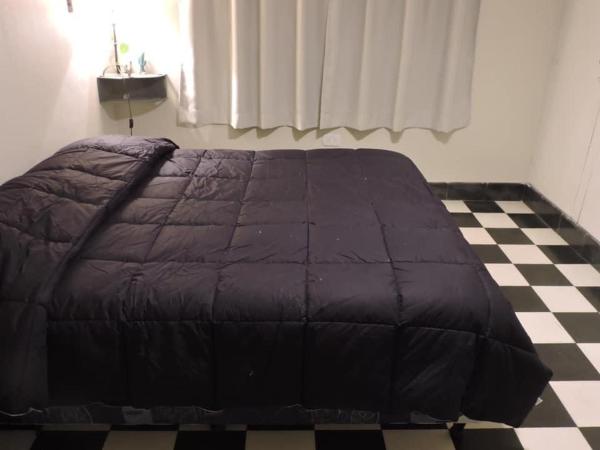 Alojamiento la salteñita : photo 2 de la chambre chambre deluxe double ou lits jumeaux