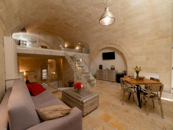 Thymus Residence nei Sassi : photo 1 de la chambre suite supérieure en duplex avec spa