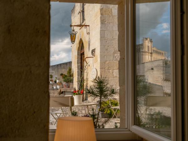 Thymus Residence nei Sassi : photo 3 de la chambre suite supérieure en duplex avec spa