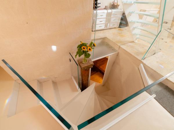 Thymus Residence nei Sassi : photo 6 de la chambre suite supérieure en duplex avec spa