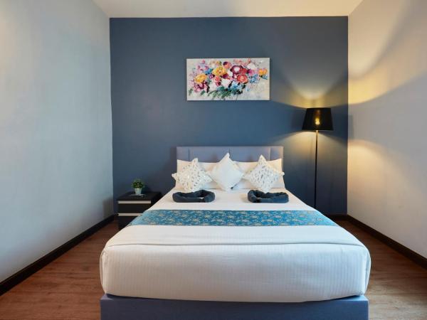 D' Qamar Guesthouse : photo 2 de la chambre chambre double