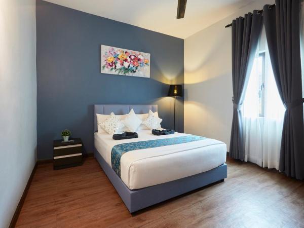 D' Qamar Guesthouse : photo 4 de la chambre chambre double