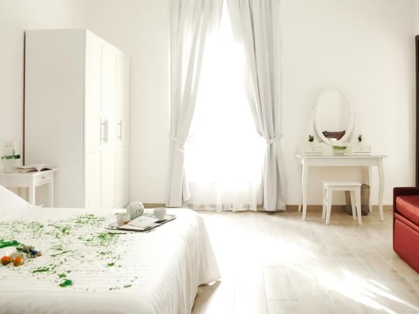 Etna Suite Group : photo 2 de la chambre chambre triple