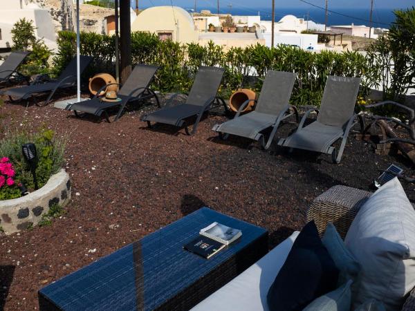 Elia 1968 Cave Houses : photo 5 de la chambre maison troglodyte avec petite piscine extérieure commune