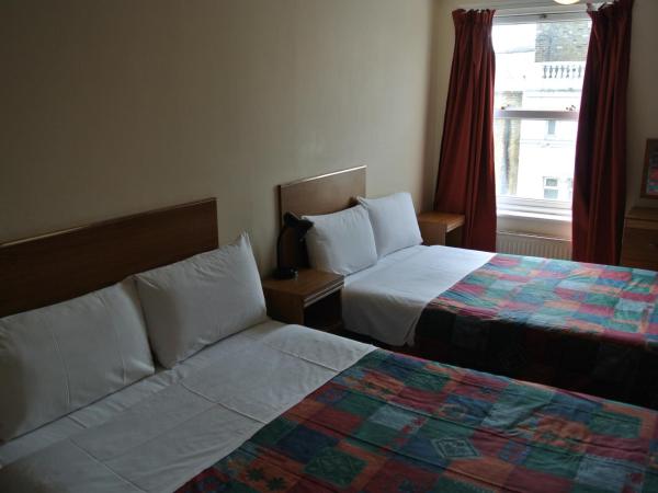 Carlton Hotel : photo 2 de la chambre chambre quadruple avec salle de bains