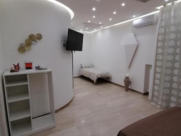 Maison Rinaldi SrL : photo 3 de la chambre grande chambre double ou lits jumeaux