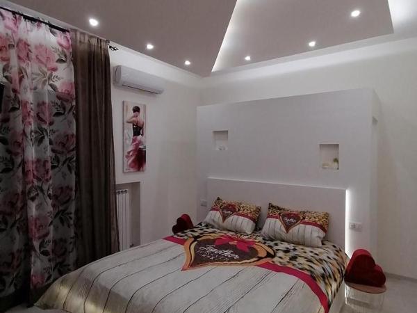 Maison Rinaldi SrL : photo 1 de la chambre chambre lit king-size avec balcon