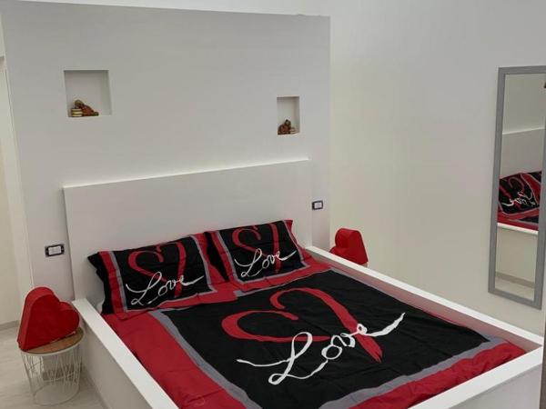 Maison Rinaldi SrL : photo 3 de la chambre chambre lit king-size avec balcon