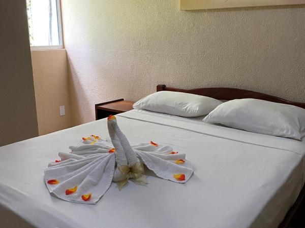 Pousada do Suiço : photo 2 de la chambre chambre triple standard