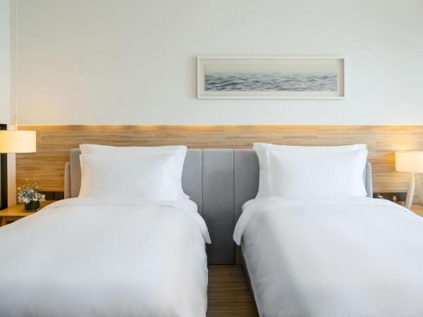 The Yun Resort Shenzhen Longcheer : photo 4 de la chambre chambre lits jumeaux avec balcon