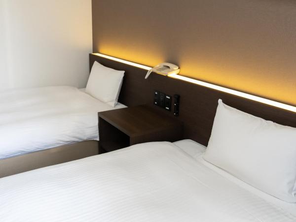 Heiwadai Hotel Tenjin : photo 2 de la chambre chambre lits jumeaux - fumeurs
