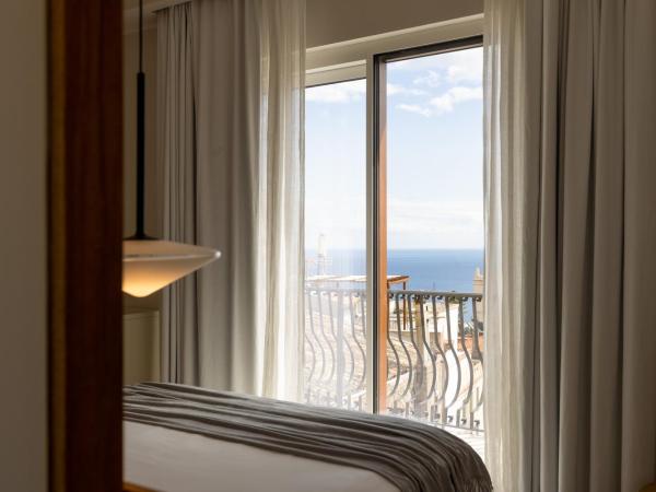 Taodomus Boutique Hotel : photo 4 de la chambre chambre double supérieure - vue partielle sur mer